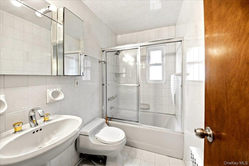 2 family Brick Semi attached Ideally located in Pelham Gardens - photo 5