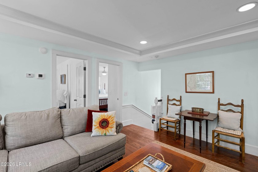 Anchored by a magnificent 400 year old live oak at the front of - photo 7