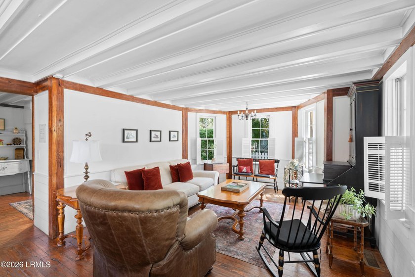 Anchored by a magnificent 400 year old live oak at the front of - photo 10