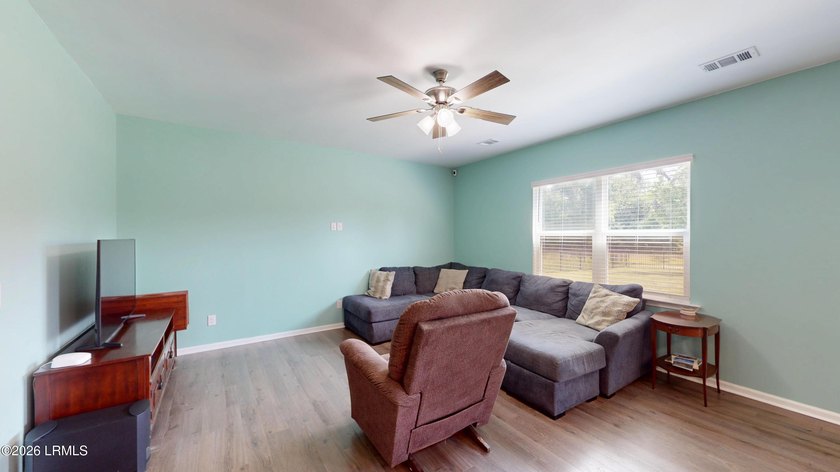 Thoughtfully upgraded throughout, this 4 bedroom, 2.5 bath - photo 6