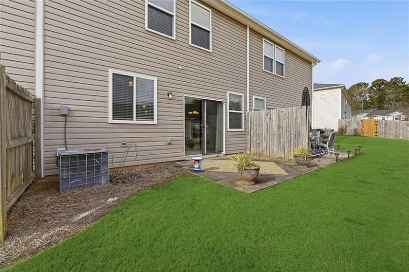 Built in 2005, this 1,551 sq. ft. 2-story townhome features 3 - photo 4