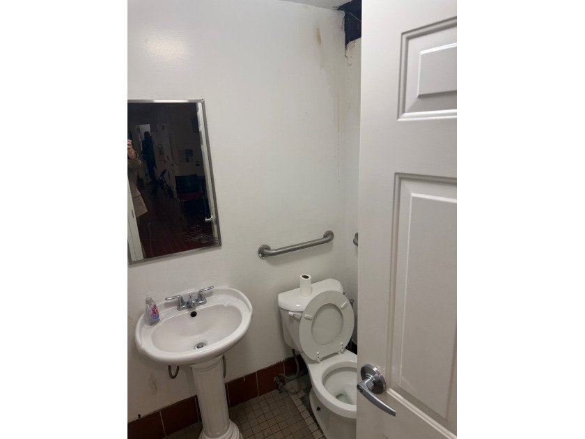 Introducing a beautifully maintained two-family home situated in - photo 11