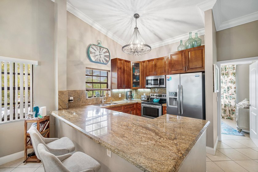Welcome to this spacious 3-bedroom, 2-bathroom condo featuring - photo 12