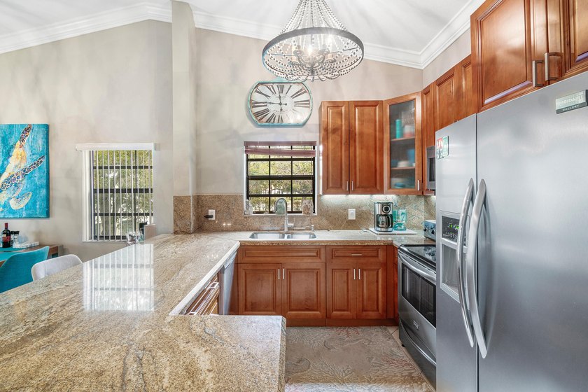 Welcome to this spacious 3-bedroom, 2-bathroom condo featuring - photo 17