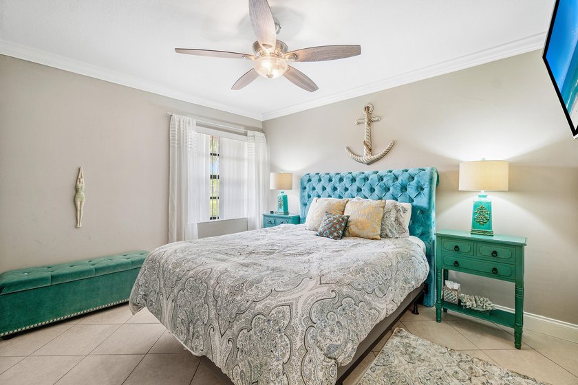 Welcome to this spacious 3-bedroom, 2-bathroom condo featuring - photo 22