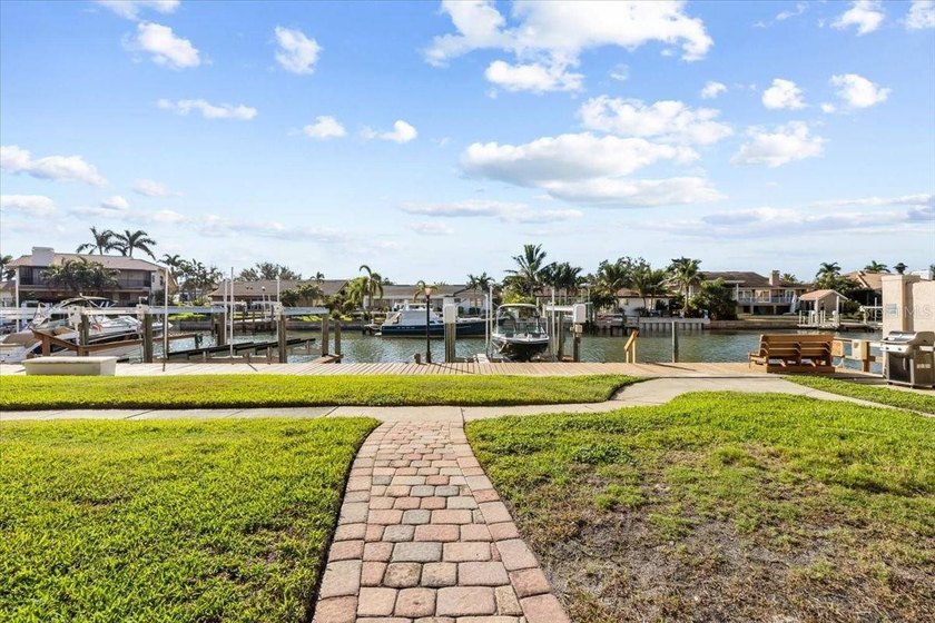 BOAT SLIP/ LIFT - PRIVATE GARAGE - FULLY RENOVATED WATERFRONT - photo 35