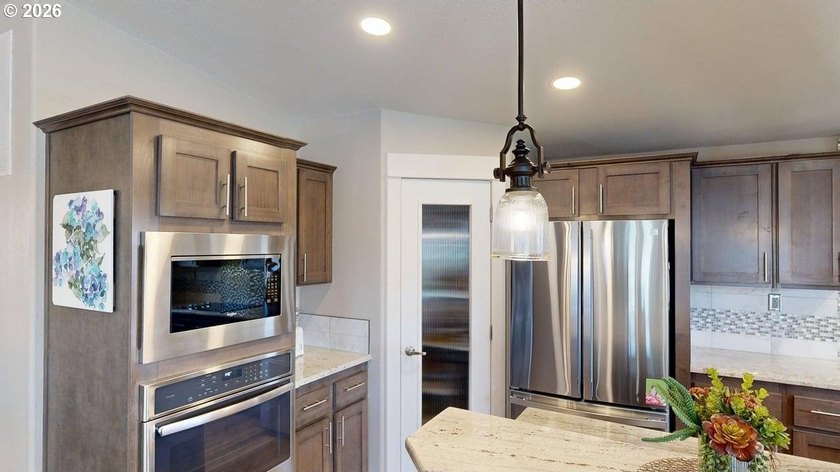 Tucked inside a private gated community along the Southern - photo 13