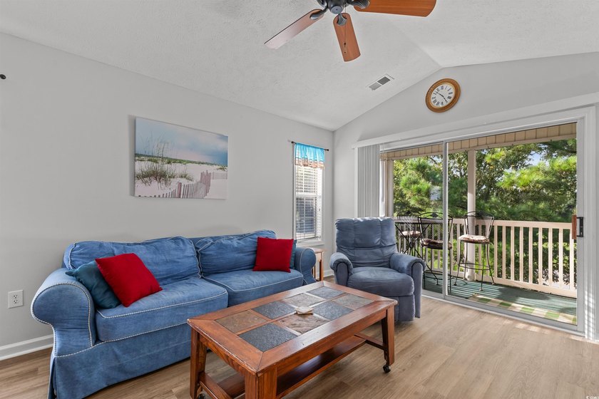 This move-in ready third-floor condo in the River Oaks community - photo 11