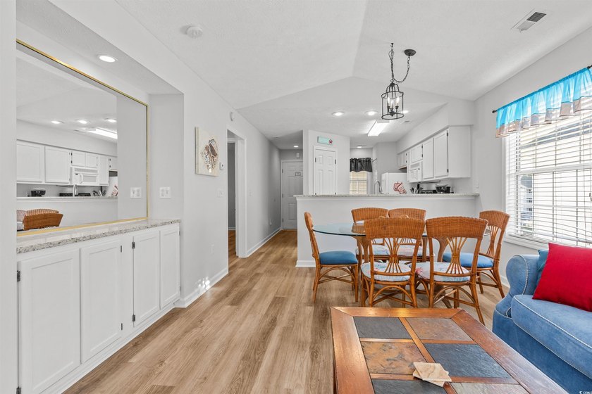 This move-in ready third-floor condo in the River Oaks community - photo 12