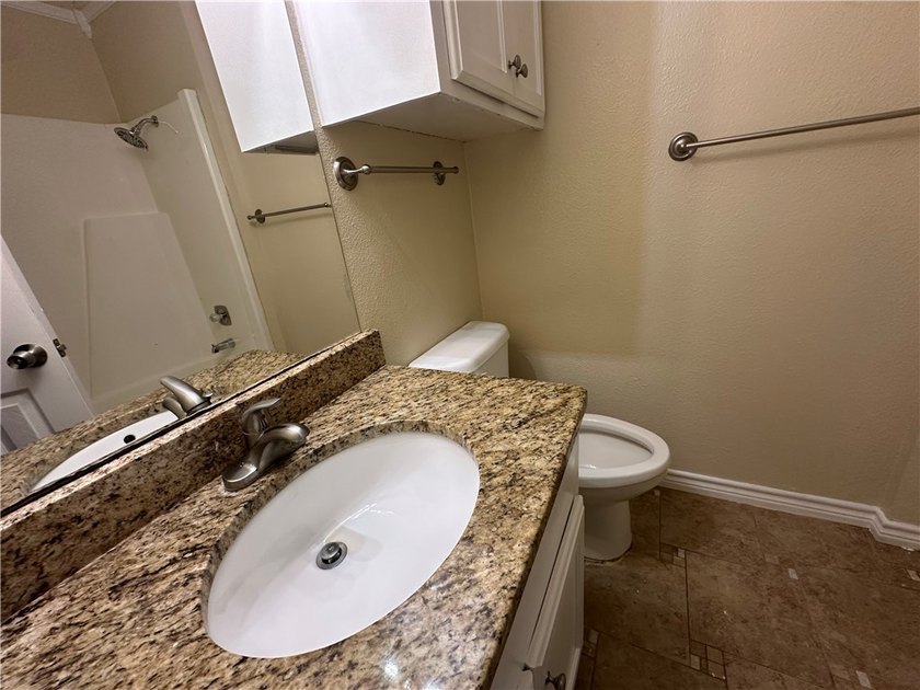 PRICED TO SELL! THIS 3 BED 2 FULL BATH HOME HAS BEEN REMODELED - photo 12