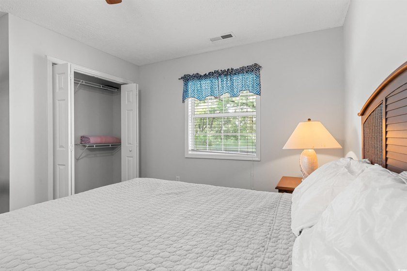 This move-in ready third-floor condo in the River Oaks community - photo 13