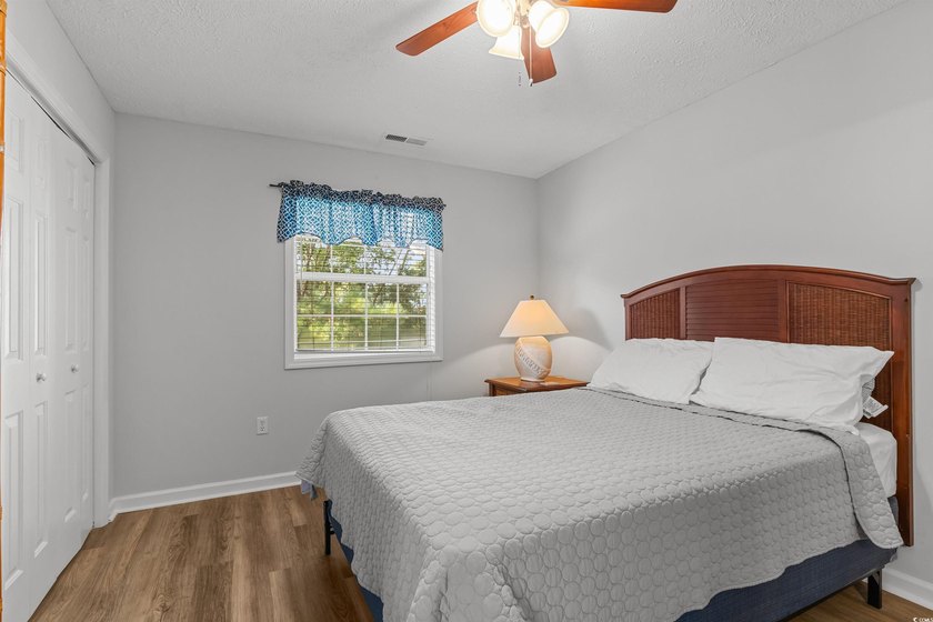 This move-in ready third-floor condo in the River Oaks community - photo 15