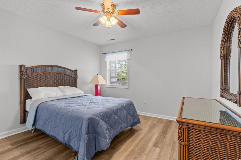This move-in ready third-floor condo in the River Oaks community - photo 18