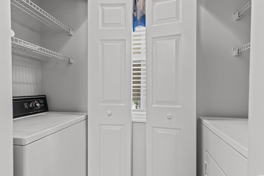 This move-in ready third-floor condo in the River Oaks community - photo 21
