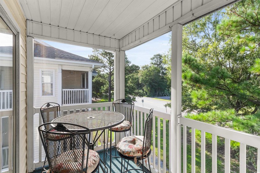 This move-in ready third-floor condo in the River Oaks community - photo 23