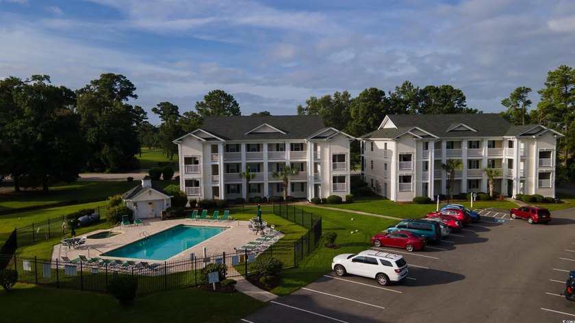 This move-in ready third-floor condo in the River Oaks community - photo 25