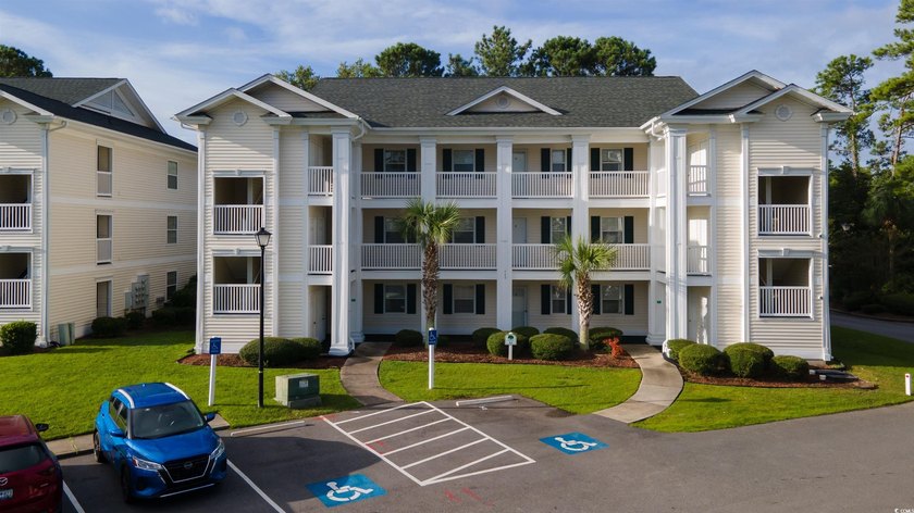 This move-in ready third-floor condo in the River Oaks community - photo 26