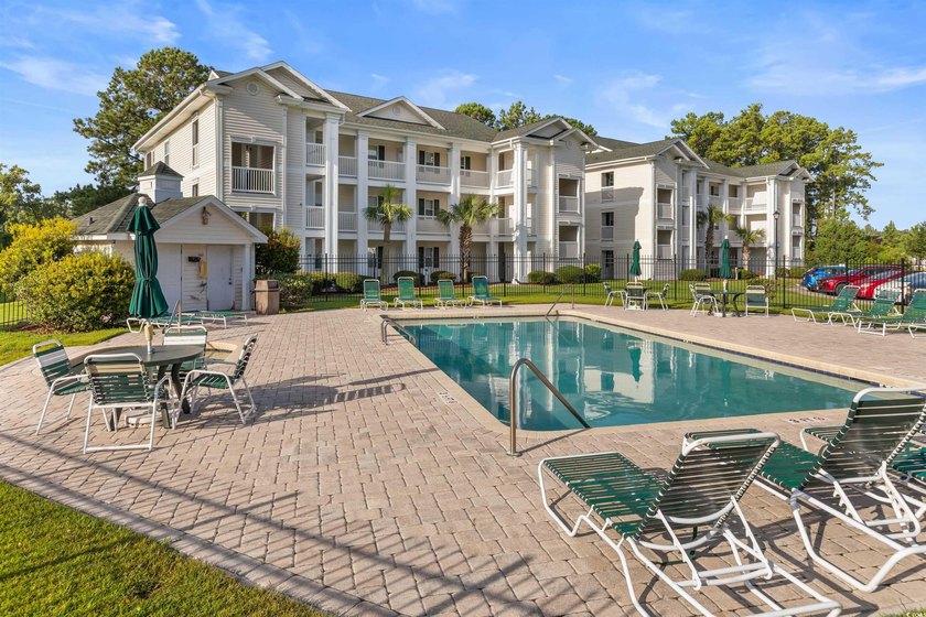 This move-in ready third-floor condo in the River Oaks community - photo 27