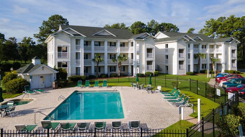 This move-in ready third-floor condo in the River Oaks community - photo 28