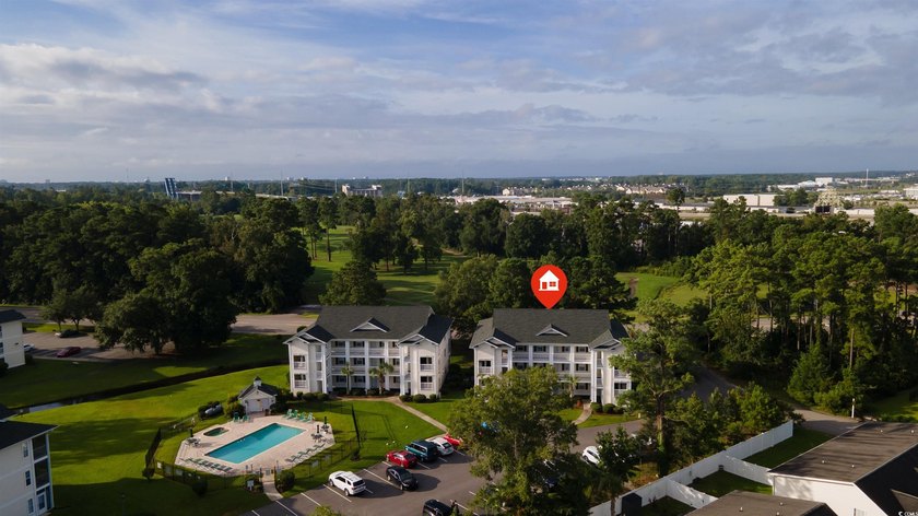 This move-in ready third-floor condo in the River Oaks community - photo 31