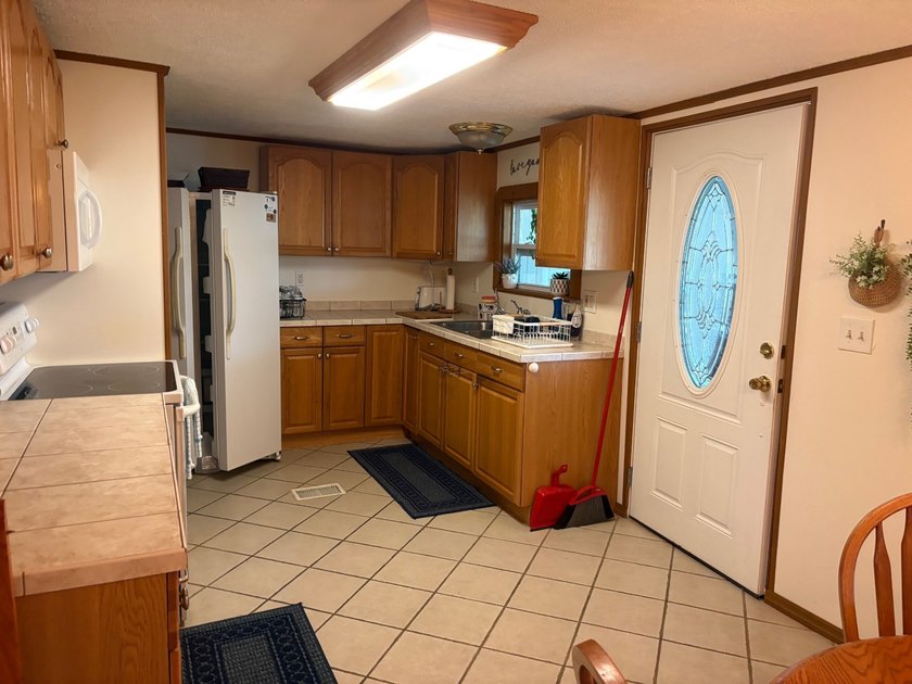 This beautifully remodeled home has 2 Bedrooms with Master - photo 13