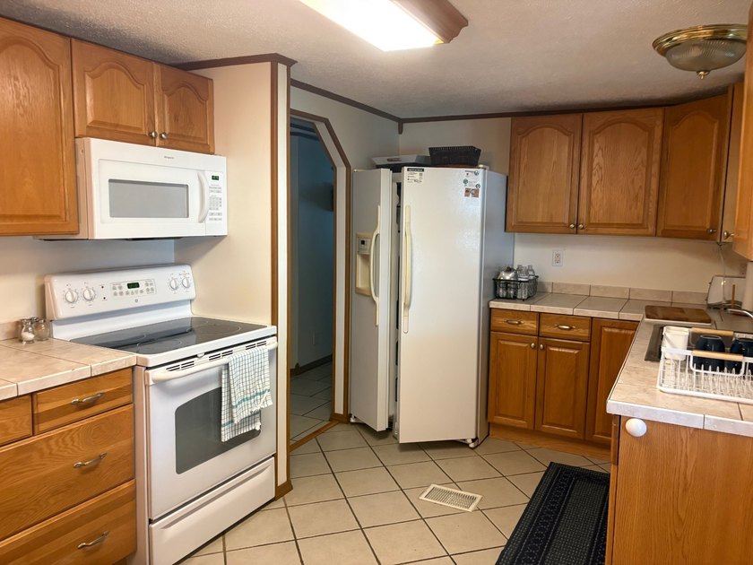 This beautifully remodeled home has 2 Bedrooms with Master - photo 14