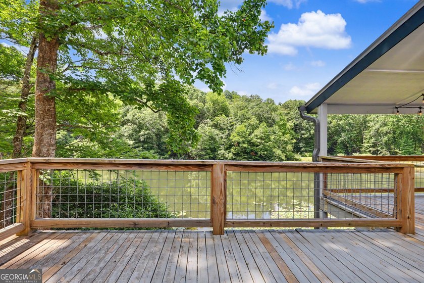 Enjoy true lakefront living at this spacious mountain retreat - photo 9