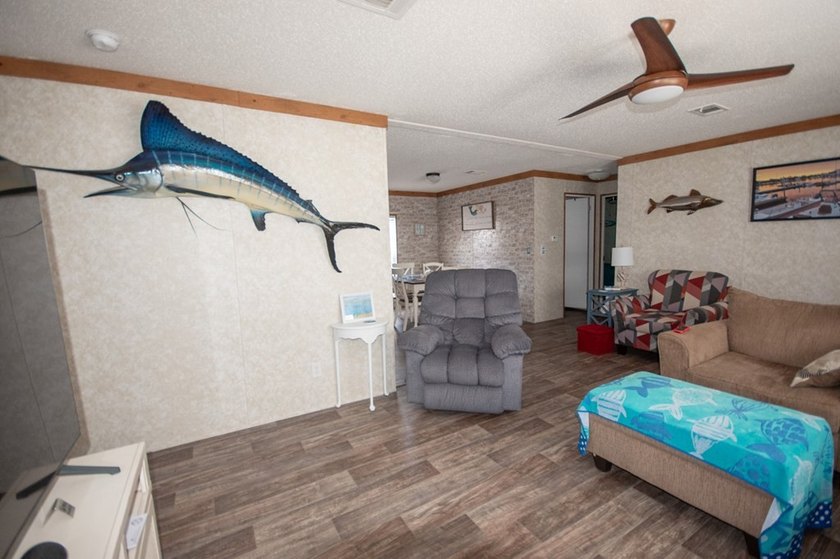 *NO FLOOD ZONE * Welcome to this turnkey coastal retreat nestled - photo 5