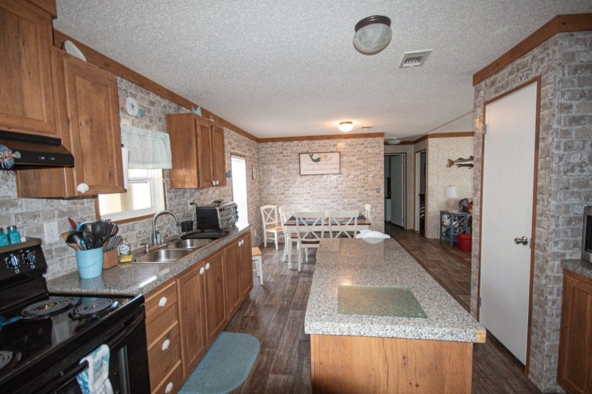 *NO FLOOD ZONE * Welcome to this turnkey coastal retreat nestled - photo 7