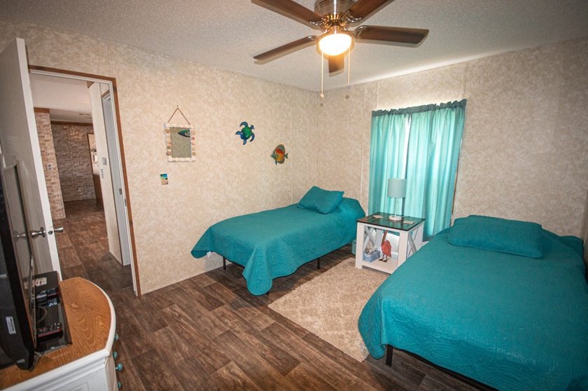 *NO FLOOD ZONE * Welcome to this turnkey coastal retreat nestled - photo 10