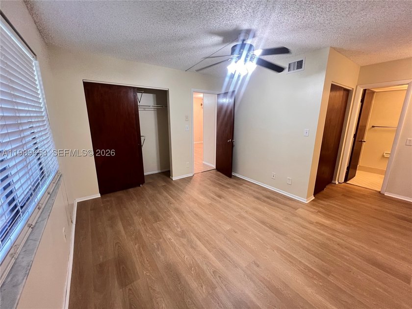 Beautiful 2/2 on the first floor with stunning lake views! - photo 11