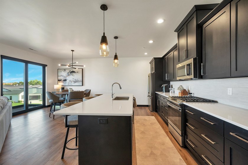 Maintenance-free waterfront living! Enjoy high end condo living - photo 20