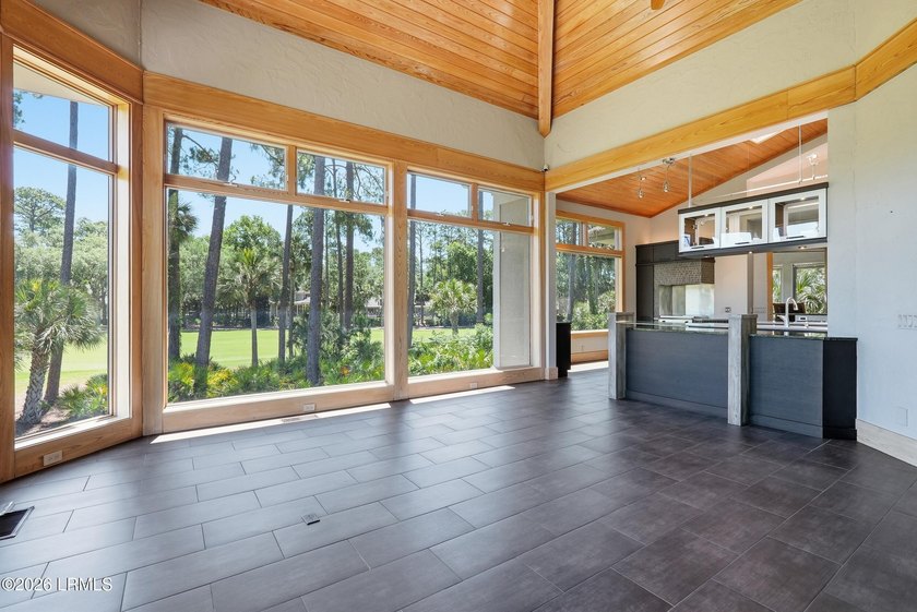 Sweeping 180-degree golf and lagoon views overlooking the 12th - photo 8