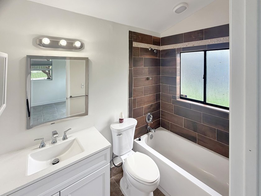 752 Orchid Dr is a 1-story Royal Palm Beach home, gives an open - photo 18