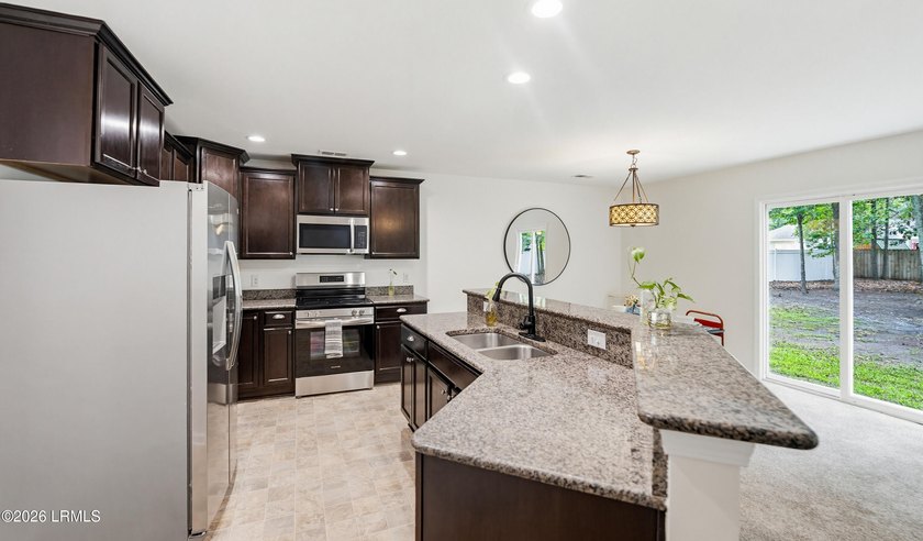 Turn Key 4 Bed 2.5 Bath home with a big yard in the desirable - photo 3