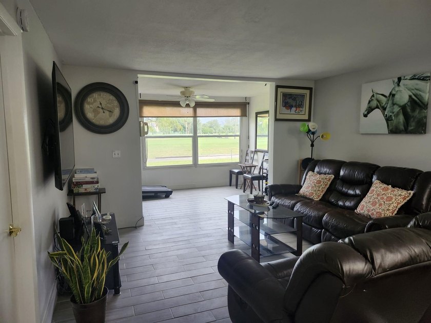 WOW!!! RARELY AVAILABLE REMODLED GROUND FLOOR CORNER UNIT - photo 3