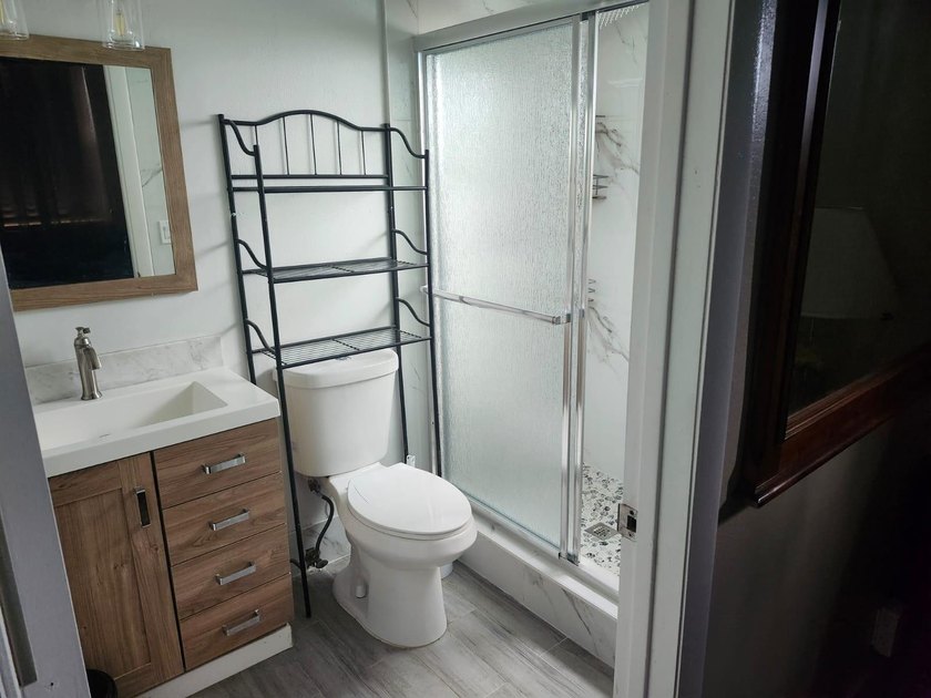 WOW!!! RARELY AVAILABLE REMODLED GROUND FLOOR CORNER UNIT - photo 10