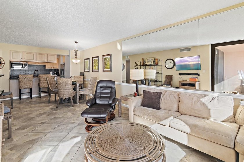 Jetty East is a Gulf front Gated 6-story midrise with under - photo 3