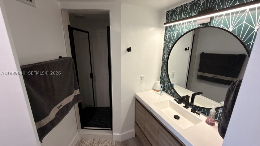 Beautifully updated and move-in ready 2/2 unit in the highly - photo 16