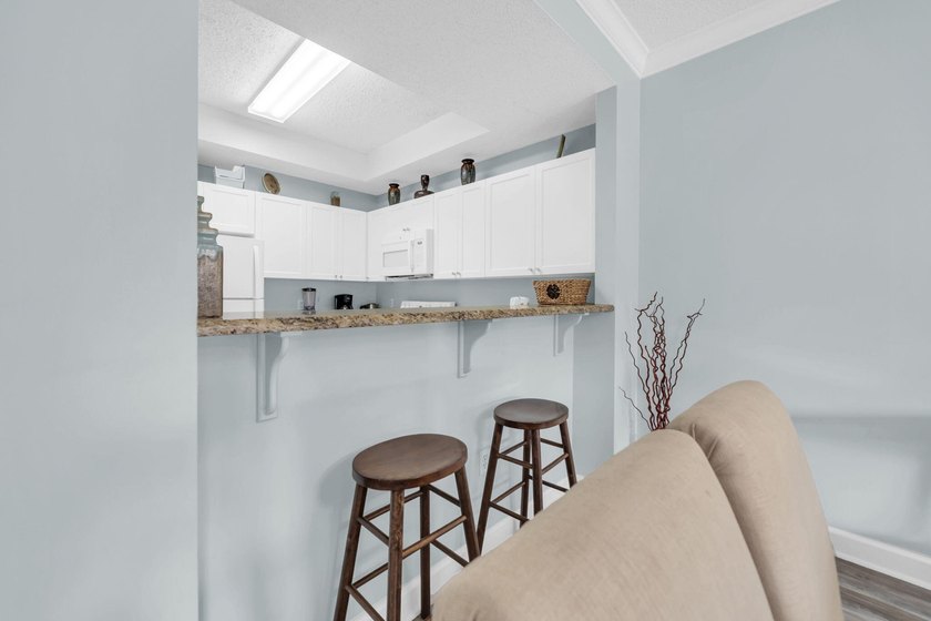 This lovely condo is your ticket to the fabulous beach lifestyle - photo 8
