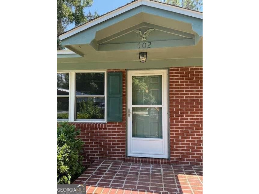 Welcome to this quaint, all-brick home nestled in the heart of - photo 5