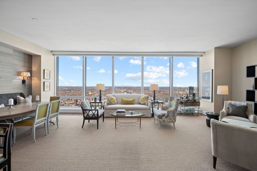 Perched 1,000 feet above the city skyline on the 79th floor is - photo 3
