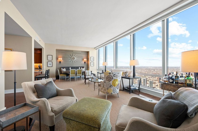 Perched 1,000 feet above the city skyline on the 79th floor is - photo 8