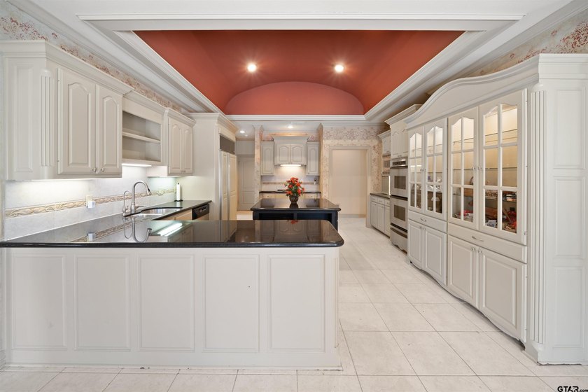 Welcome to 7402 Hollytree Dr., an exceptional estate situated on - photo 12