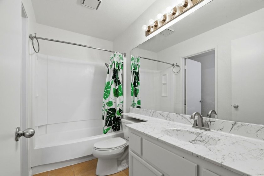 Stunning condo located in one of the most desirable locations in - photo 12