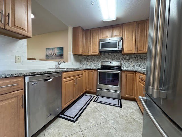 This fully furnished ground floor condo has tile floor and - photo 4