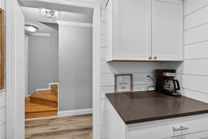 This adorable furnished condo has been remodeled and is in - photo 11