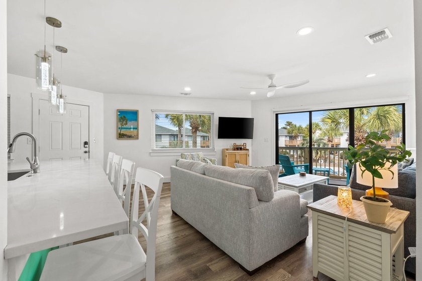 Fully furnished with $55,000 invested in stylish upgrades, plus - photo 8