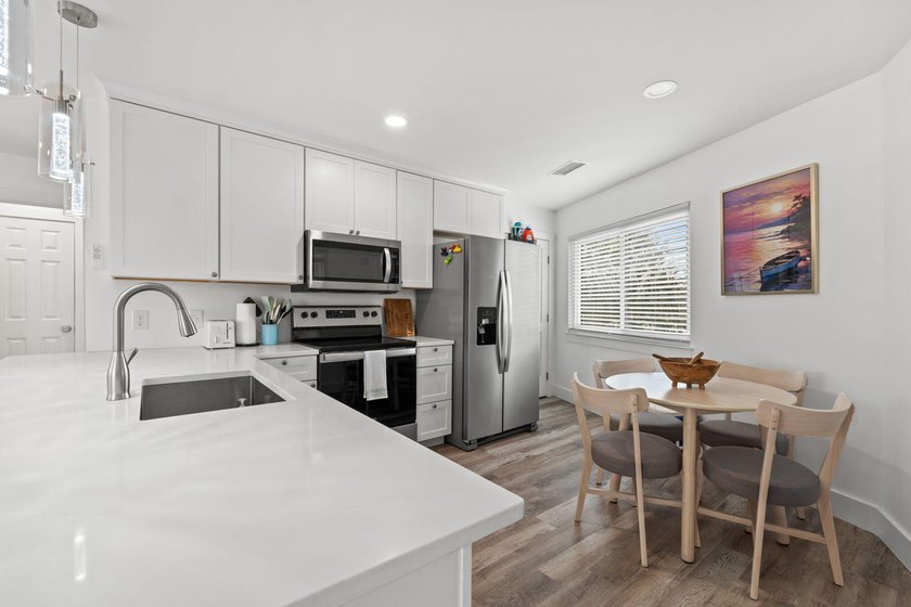Fully furnished with $55,000 invested in stylish upgrades, plus - photo 9