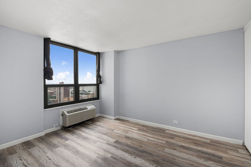 Stunning panoramic lake and city views steal the show in this - photo 10